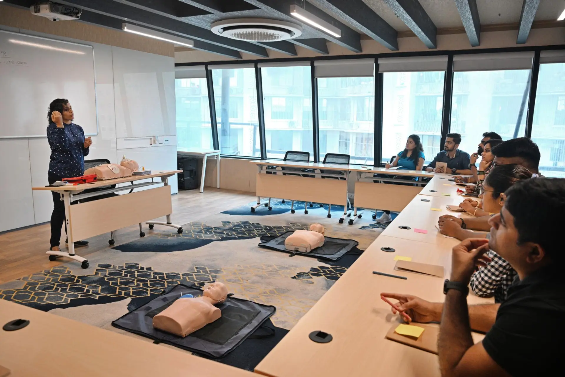 Instructor delivering PHECC First Aid Response training to workplace learners